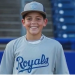 A 12-year-old baseball player, Xavier Taylor, was reportedly hospitalized after a serious accident during a pregame warmup. Family, teammates, and supporters are rallying around the young athlete as updates continue to emerge.